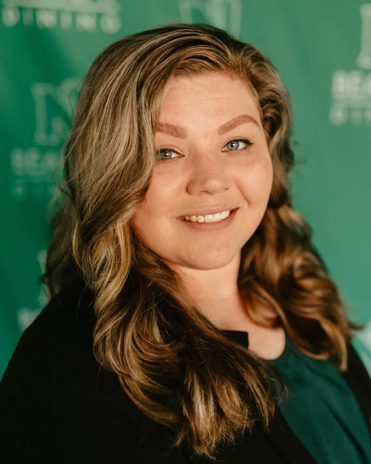 Jessica Endicott in front of NWMSU background