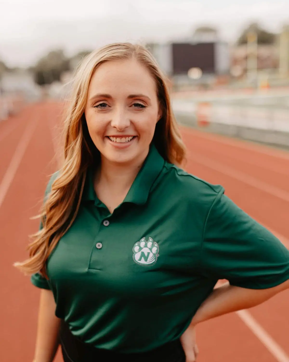 Trisha Ellis in NWMSU shirt on track